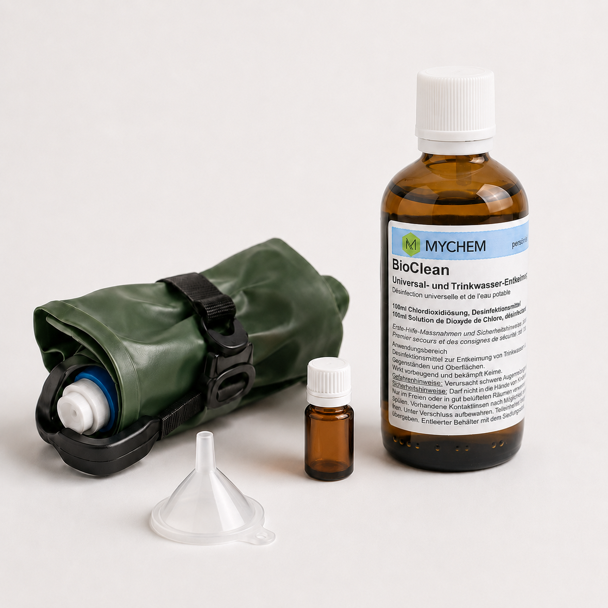 BioClean 100 ml mit leerer 10-ml-Tropfflasche und BeFree-Flasche für Velotouren und Bikepacking